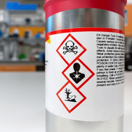 Chemical-resistant label withstanding alcohol, oil, and grease exposure in industrial and manufacturing environments